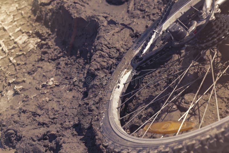The Bicycle wheel is stuck in the mud. Close up royalty free stock image The Bicycle wheel is stuck in the mud. Close up royalty free stock image