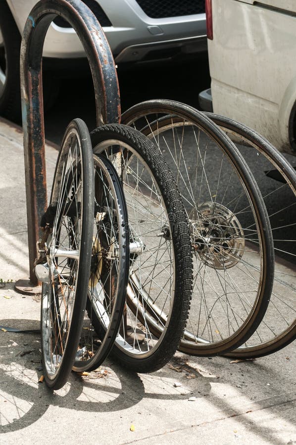 Bicycle Wheels Locked To Pole Stock Photo Image of criminal, steal
