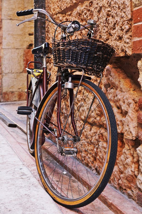 Bicycle with a Wicker Basket with Old Brick Walls Stock Image Image