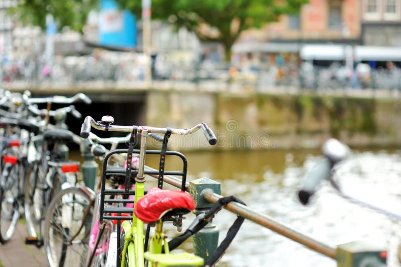 Bicycles Parked on the Bridge Over Canal in Amsterdam, Netherlands ...