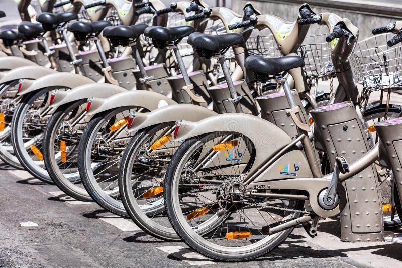 Bicycles of the Velib Bike Rental Service. Paris, France Editorial Stock Image - Image of