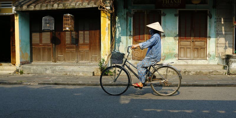 Bicycling in the street of hoi an , Vietnam. Bicycling in the street of hoi an , Vietnam