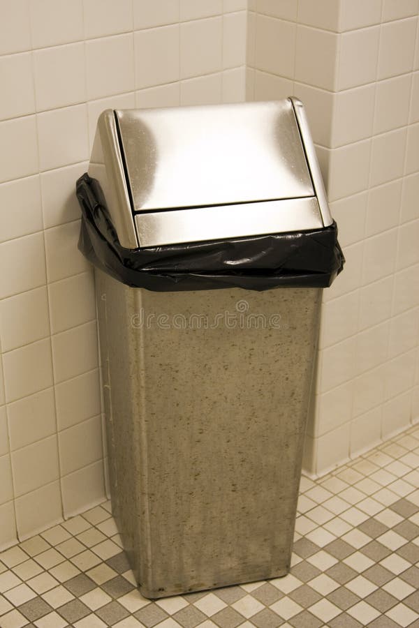 Garbage Can in Restroom with Black Bag. Garbage Can in Restroom with Black Bag