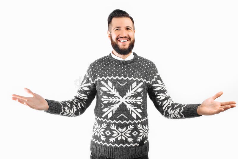Bienvenido Hombre joven hermoso con una barba, gestos y sonrisas imagen de archivo Bienvenido Hombre joven hermoso con una barba, gestos y sonrisas imagen de archivo