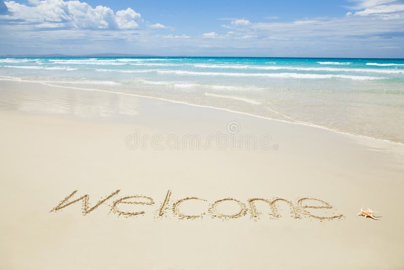 Welcome written on a tropical beach. Welcome written on a tropical beach