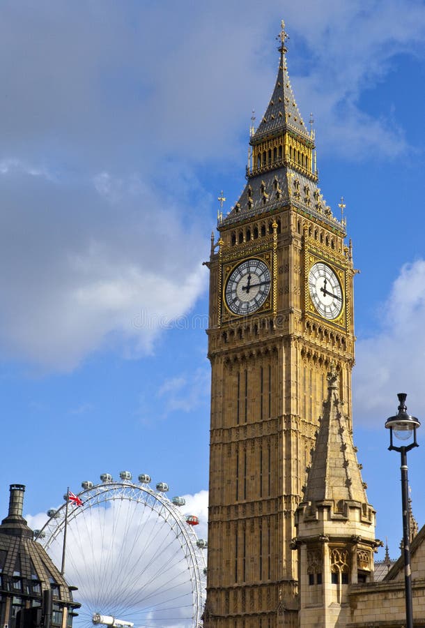 Big Ben and the London Eye editorial stock image. Image of cities 38413349