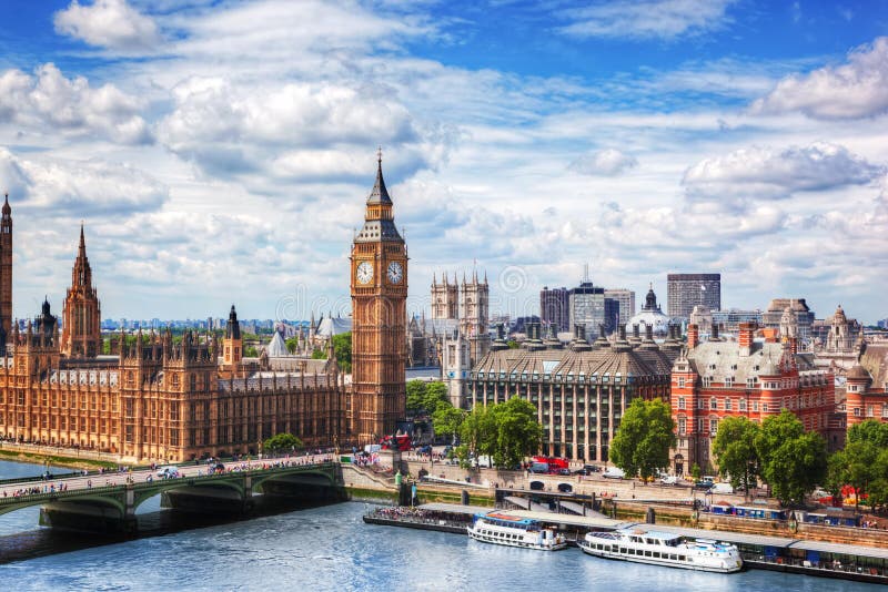 Big Ben, Westminster Bridge on River Thames in London, the UK. English symbol. Lovely puffy clouds, sunny day. Big Ben, Westminster Bridge on River Thames in London, the UK. English symbol. Lovely puffy clouds, sunny day