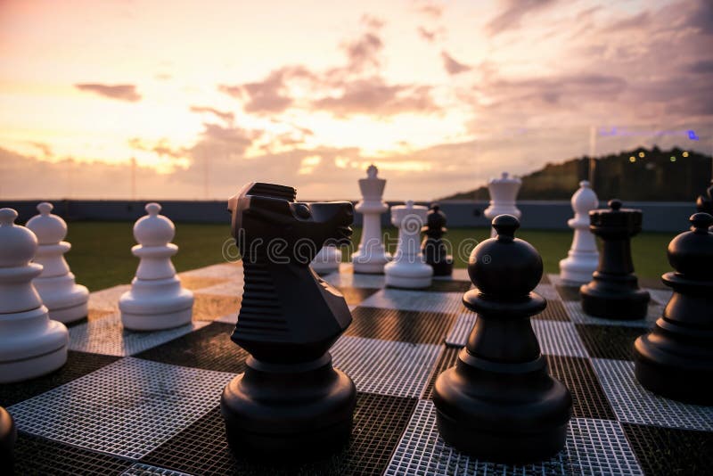 Wallpaper Chess Pieces on Wooden Table During Sunset, Background - Download  Free Image