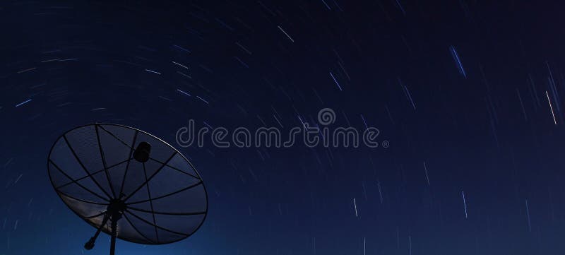 Big Black satellite over spiral star at night