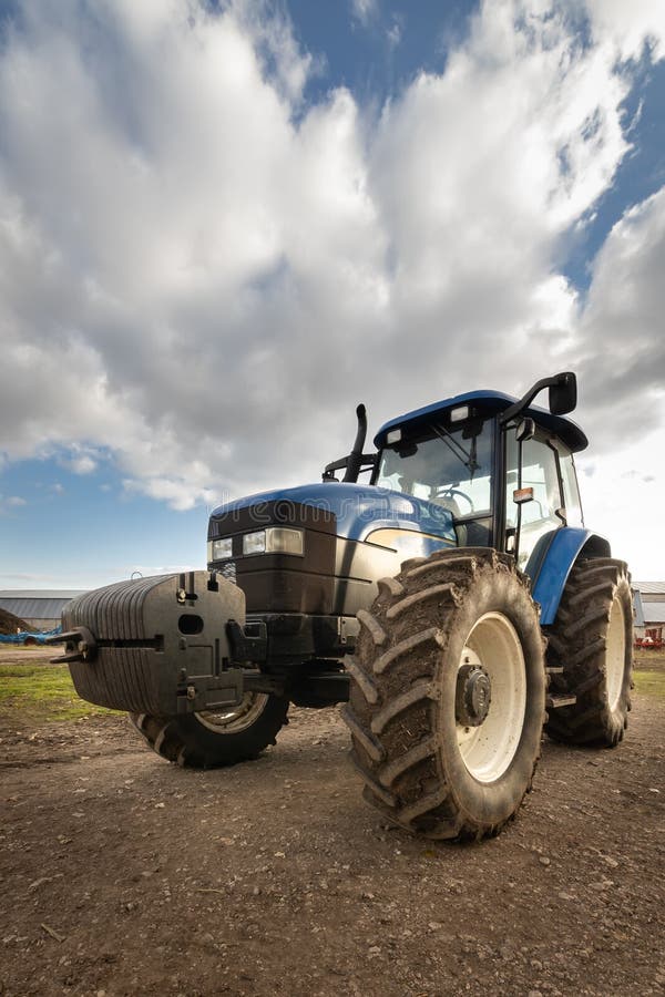 Big blue modern tractor stock photo. Image of farmland 237822614