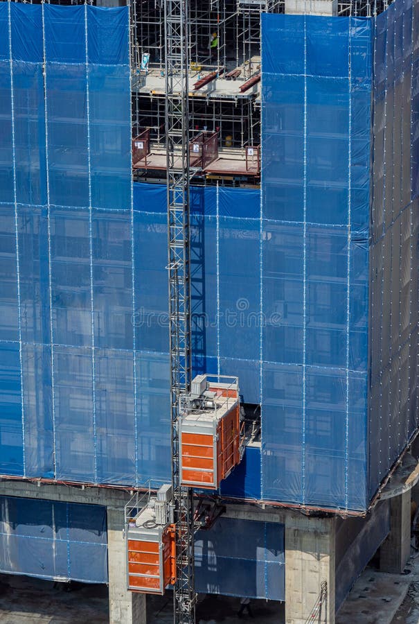 Big Elevator on the Exterior of a New Building Construction Stock Image
