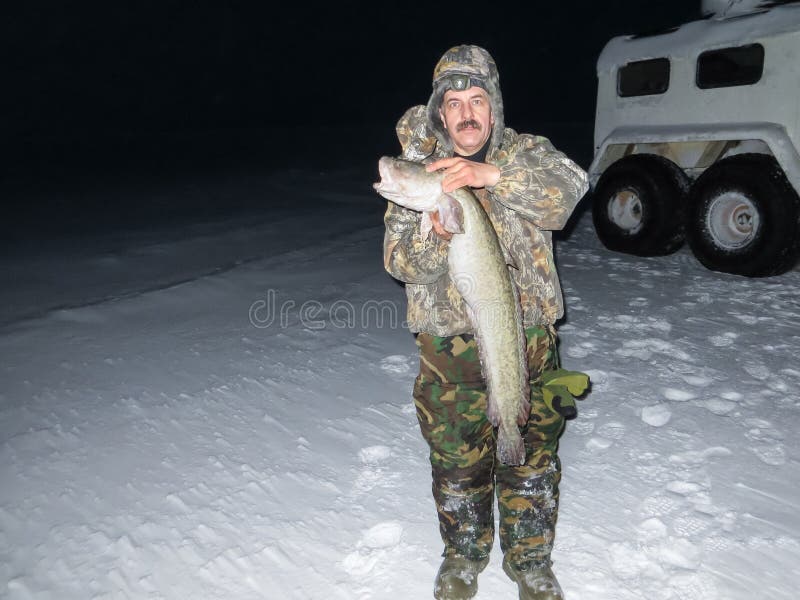 Big fish catch winter royalty free stock photos Big fish catch winter royalty free stock photos
