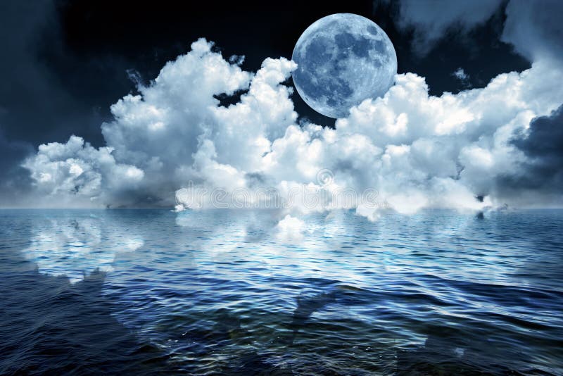 Romantic night time oceanscape reflecting a brilliant full moon and soft white clouds on a water surface rippling with gentle waves. Romantic night time oceanscape reflecting a brilliant full moon and soft white clouds on a water surface rippling with gentle waves.