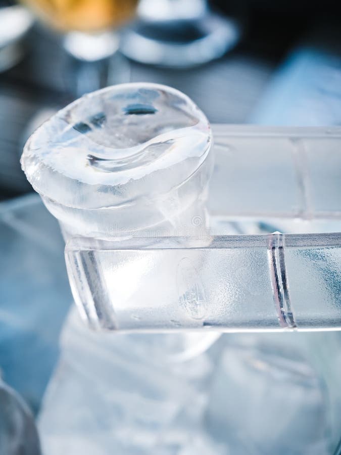 Big Ice Cube in Ice Tongs Over the Bucket Stock Photo - Image of water,  white: 154673844