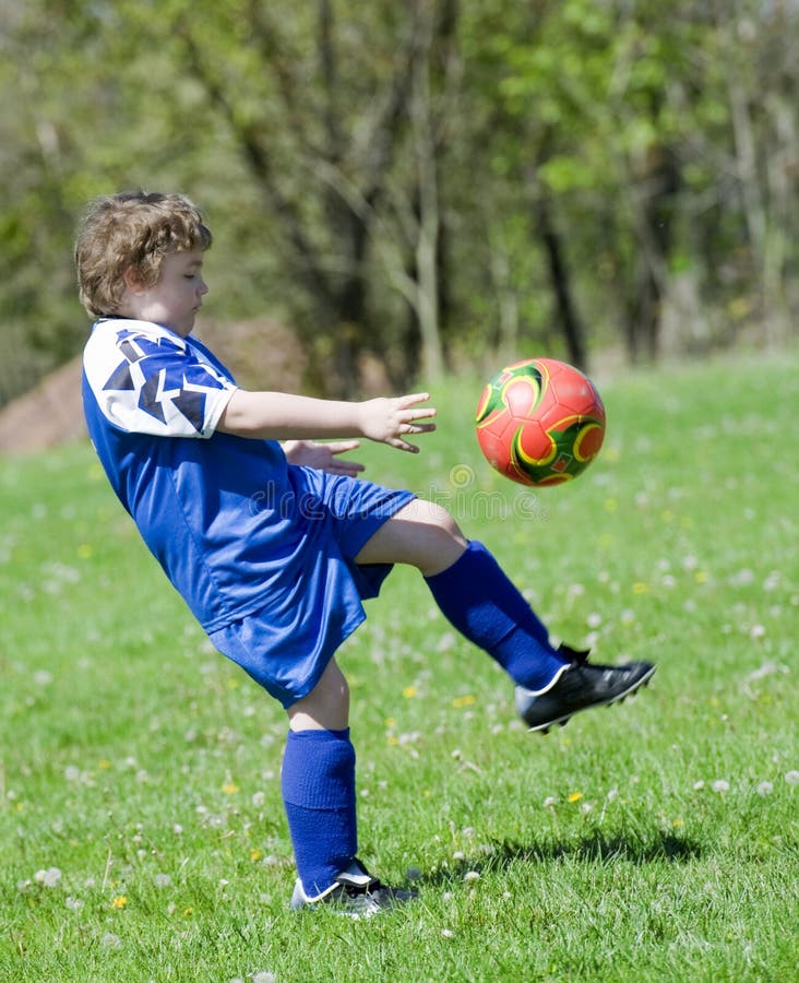 Big Kick stock photo. Image of kick, male, field, uniform - 16736860