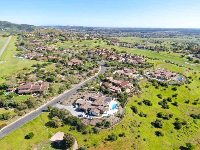 Big luxury villa with pool located next the golf course and green valley in a private community, San Diego, California. Big luxury villa with pool located next the golf course and green valley in a private community, San Diego, California.