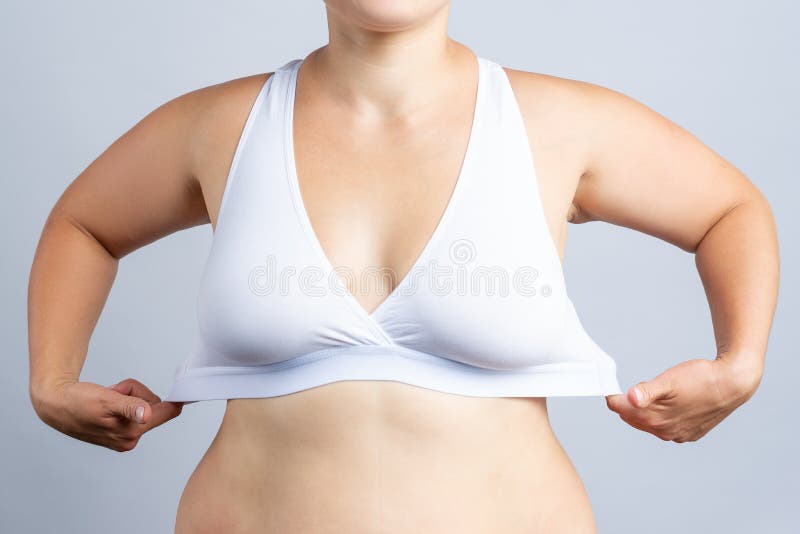 small breasts in white bra Stock Photo