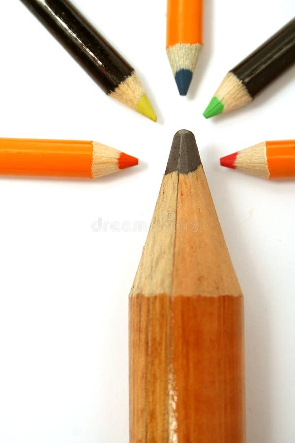 The big pencil and five small color pencils on a vertical