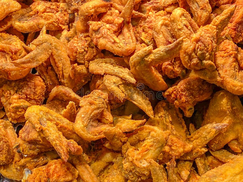 big-pile-deep-fried-chicken-wings-food-background-concept-deep-fried-chicken-wings-golden-skin-food-background-162645205.jpg