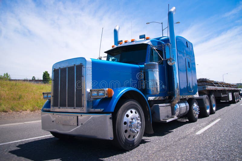 Big rig semi truck blue wolf of roads