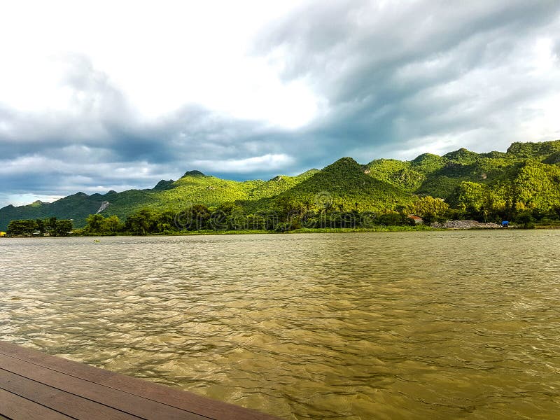 Big river green mountain and blue sky background royalty free stock images Big river green mountain and blue sky background royalty free stock images