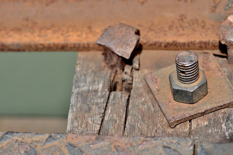 Big rusty metal nut locked with rust and corrosion bolt, Industrial bolt and nut