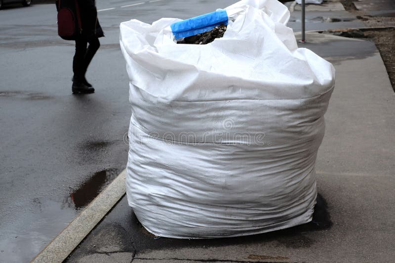 Rubbish on the Pedestrian in City with People,litter Garbage Plastic