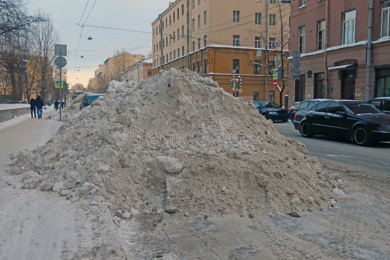 Big snowdrift on the side of the road stock photos Big snowdrift on the side of the road stock photos