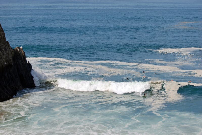 Big surf and surfers off Abalone Point near El Morro Beach and Crystal Cove south of Corona Del Mar, California. Big surf off Abalone Point near El Morro Beach stock photo Big surf and surfers off Abalone Point near El Morro Beach and Crystal Cove south of Corona Del Mar, California. Big surf off Abalone Point near El Morro Beach stock photo