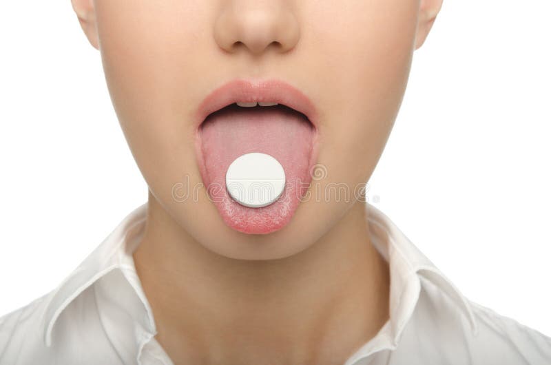 Big tablet on the tongue women stock images Big tablet on the tongue women stock images