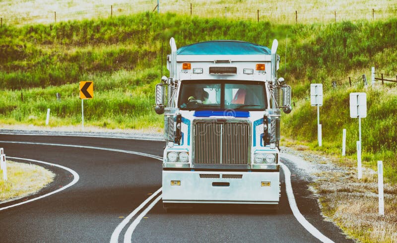 Big truck speeding up in beautiful countryside