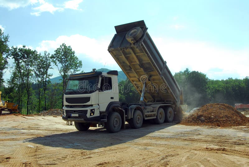 Big truck tipper at work stock photo. Image of labor 50230462