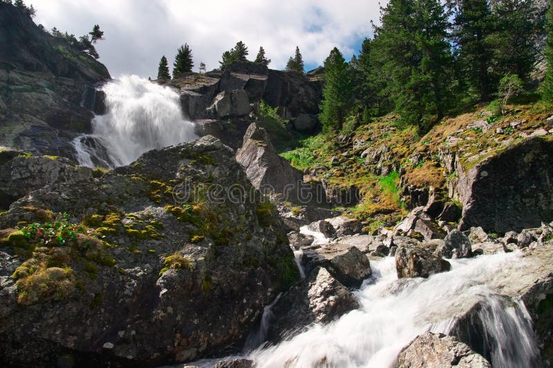 Big waterfall and mountain.