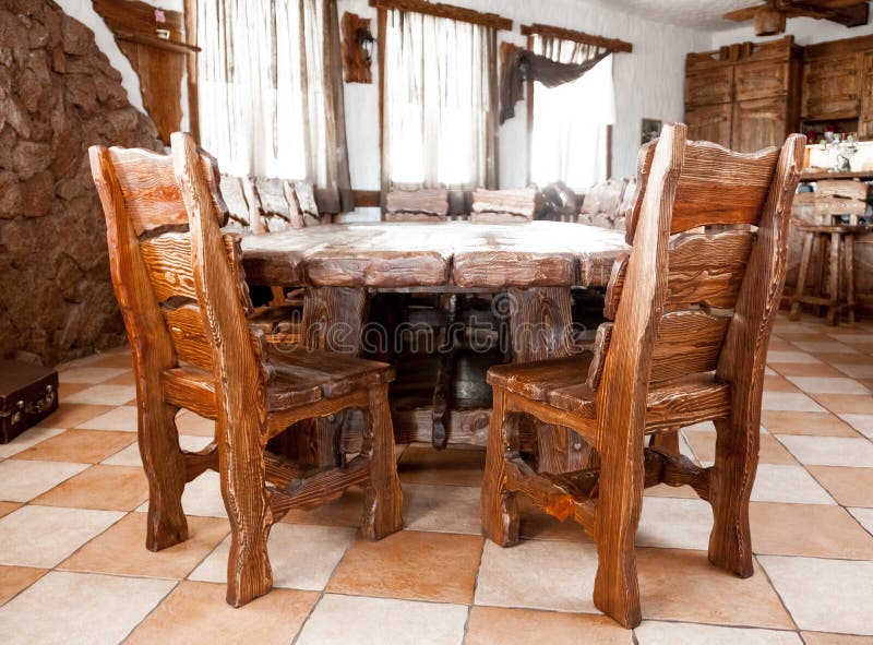 Big Wooden Table With Chairs Stock Photo - Image of cement, appartment