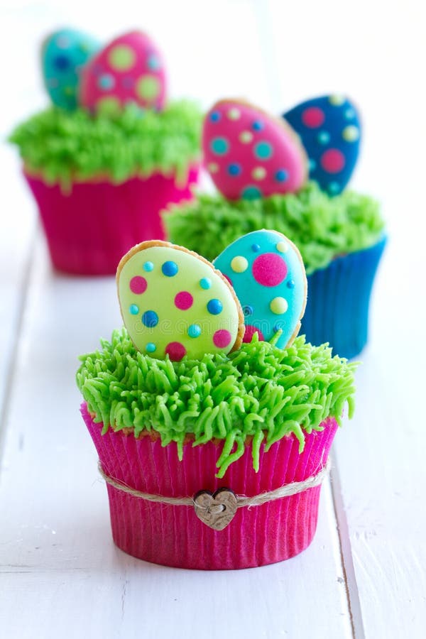 Cupcakes decorated with mini Easter cookies. Cupcakes decorated with mini Easter cookies