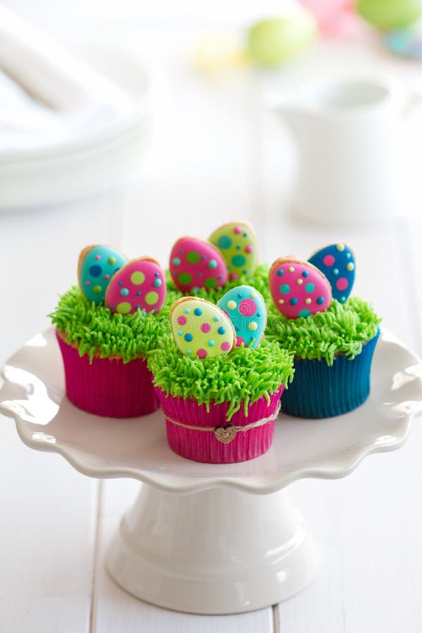 Cupcakes decorated with mini Easter cookies. Cupcakes decorated with mini Easter cookies