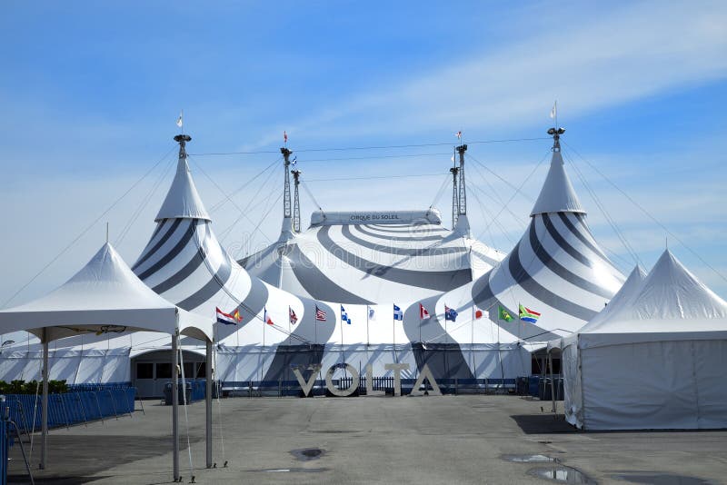 MONTREAL, CANADA - April 23, 2017: Tent of the new show of Cirque du Soleil, Canadian entertainment company. It is the largest theatrical producer in the world. Based in Montreal, Quebec, Canada. MONTREAL, CANADA - April 23, 2017: Tent of the new show of Cirque du Soleil, Canadian entertainment company. It is the largest theatrical producer in the world. Based in Montreal, Quebec, Canada