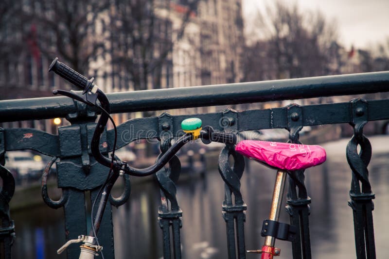 Bike on Amsterdam canal stock image. Image of bycycle, tradition 734673
