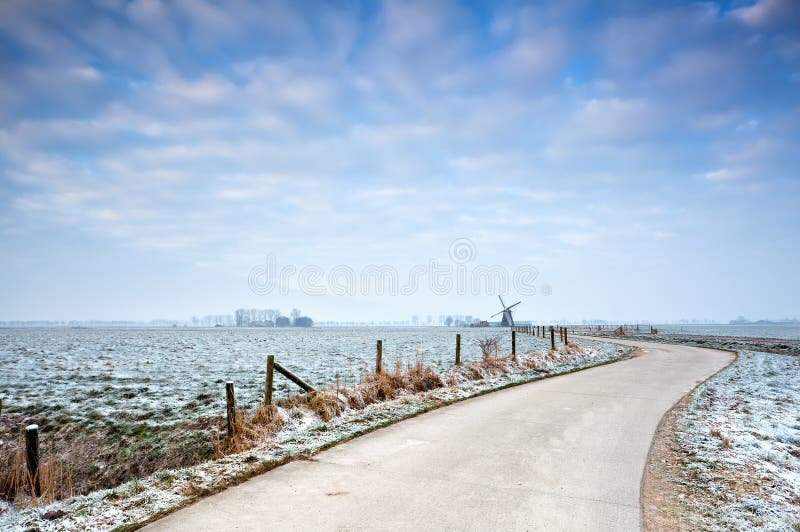 Bike road to the windmill in winter