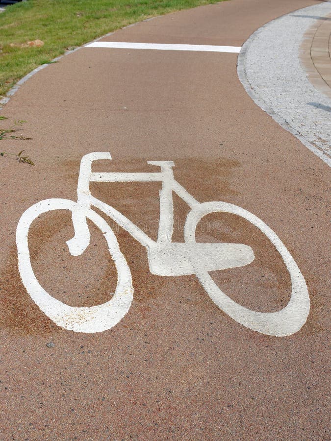 Bike route with painted bicycle symbol. Painted curve stock images, royalty-free photos and pictures