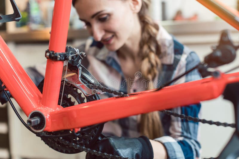 Bike Technician in Her Working on Bicycle Stock Image Image