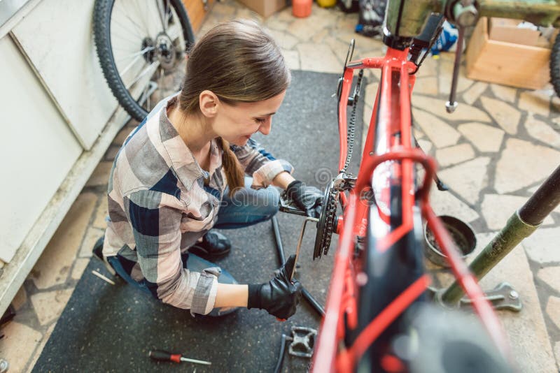 Bike Technician in Her Working on Bicycle Stock Image Image