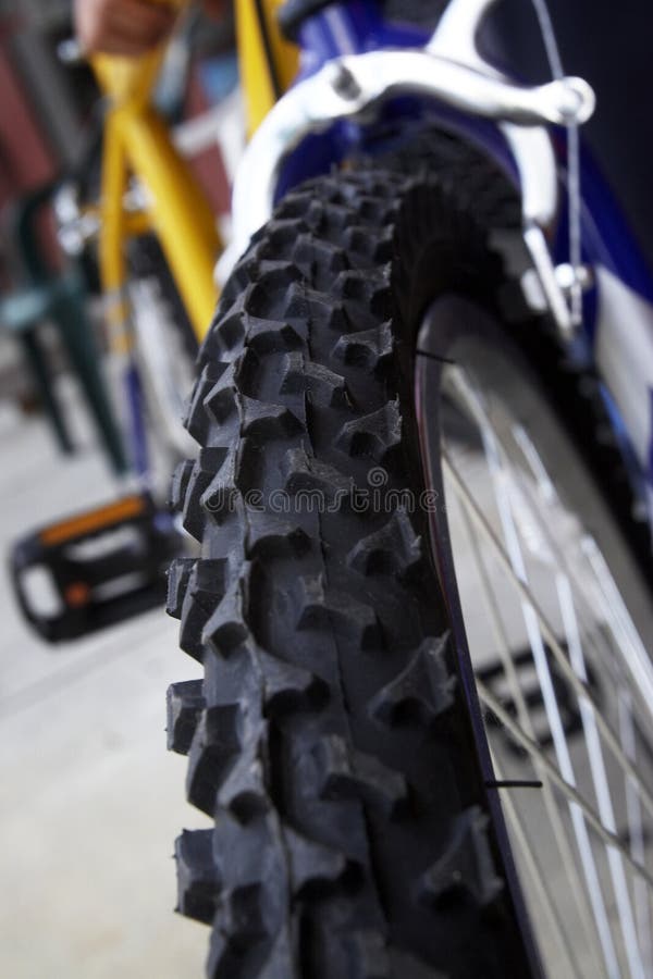 Closeup detail of a bike tire with new tread. Closeup detail of a bike tire with new tread