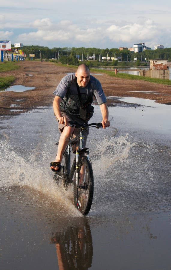 Biker Crossing The Water Picture. Image 2642209