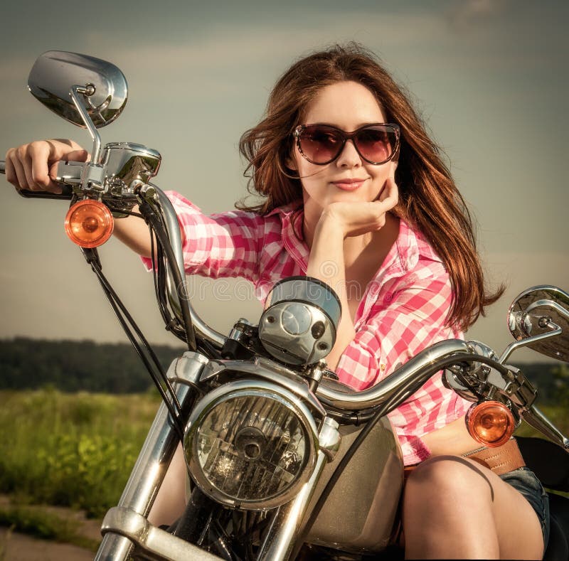 Biker Girl Sitting On Motorcycle Royalty Free Stock Photography Image