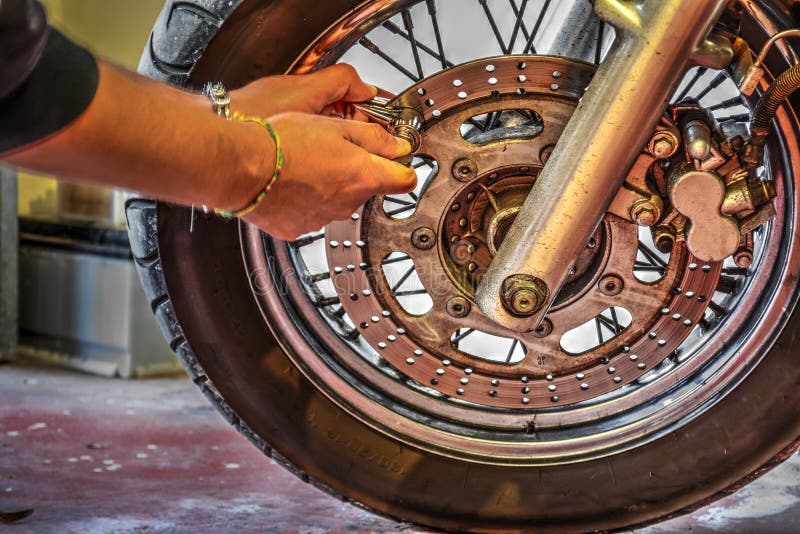 Biker Locking Front Wheel Stock Photos Free & RoyaltyFree Stock