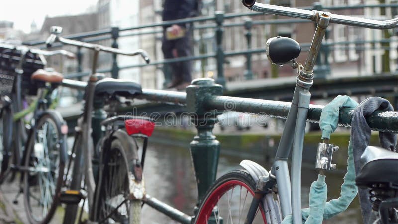 Bikes and canal an urbanscape in Amsterdam, the Netherlands