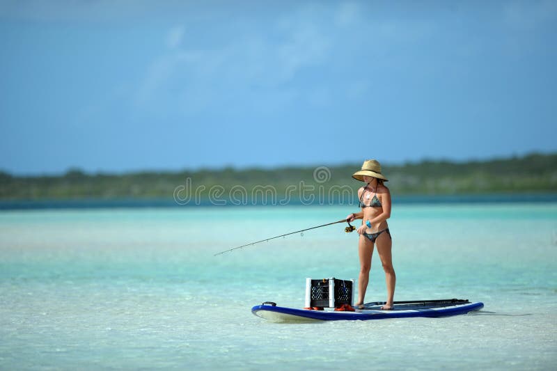 bikini abordażu połowu paddle kobieta zdjęcia royalty free bikini abordażu połowu paddle kobieta zdjęcia royalty free