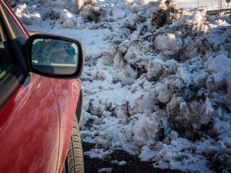 Car in a snowdrift in a dead end on a road piled with snow. Car in a snowdrift in a dead end on a road piled with snow.