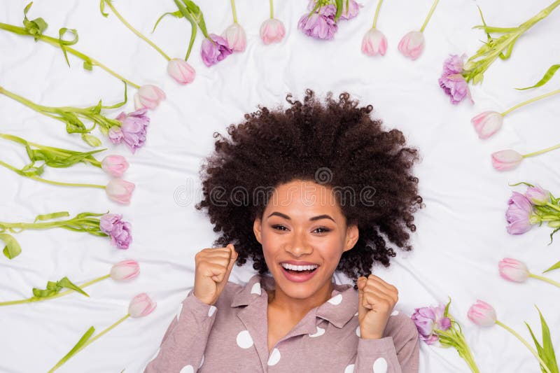 Photo of cheerful lucky lady wear pajama lying bed celebrating woman day isolated white color background. Photo of cheerful lucky lady wear pajama lying bed celebrating woman day isolated white color background.
